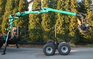 Forestry trailer for tractors with hydraulic arm