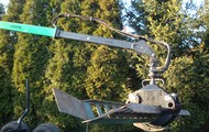 Forestry trailer for tractors with hydraulic arm