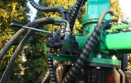 Forestry trailer for tractors with hydraulic arm