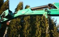 Forestry trailer for tractors with hydraulic arm