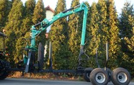 Forestry trailer for tractors with hydraulic arm